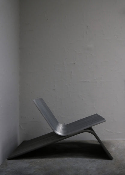 "LOUNGE CHAIR IN STEEL" BY MANU BANO