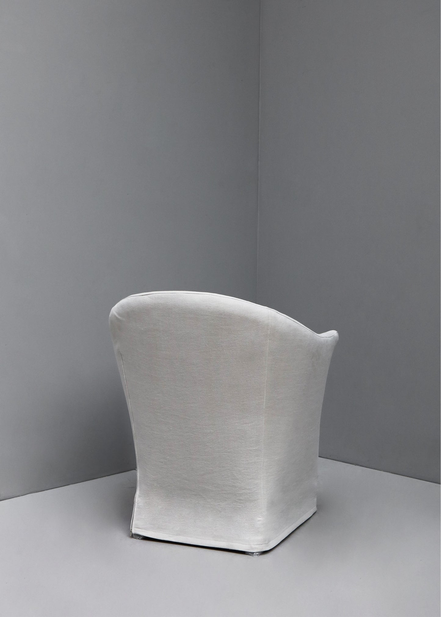 "ROUND DINING ARMCHAIR" BY OLIVER GUSTAV
