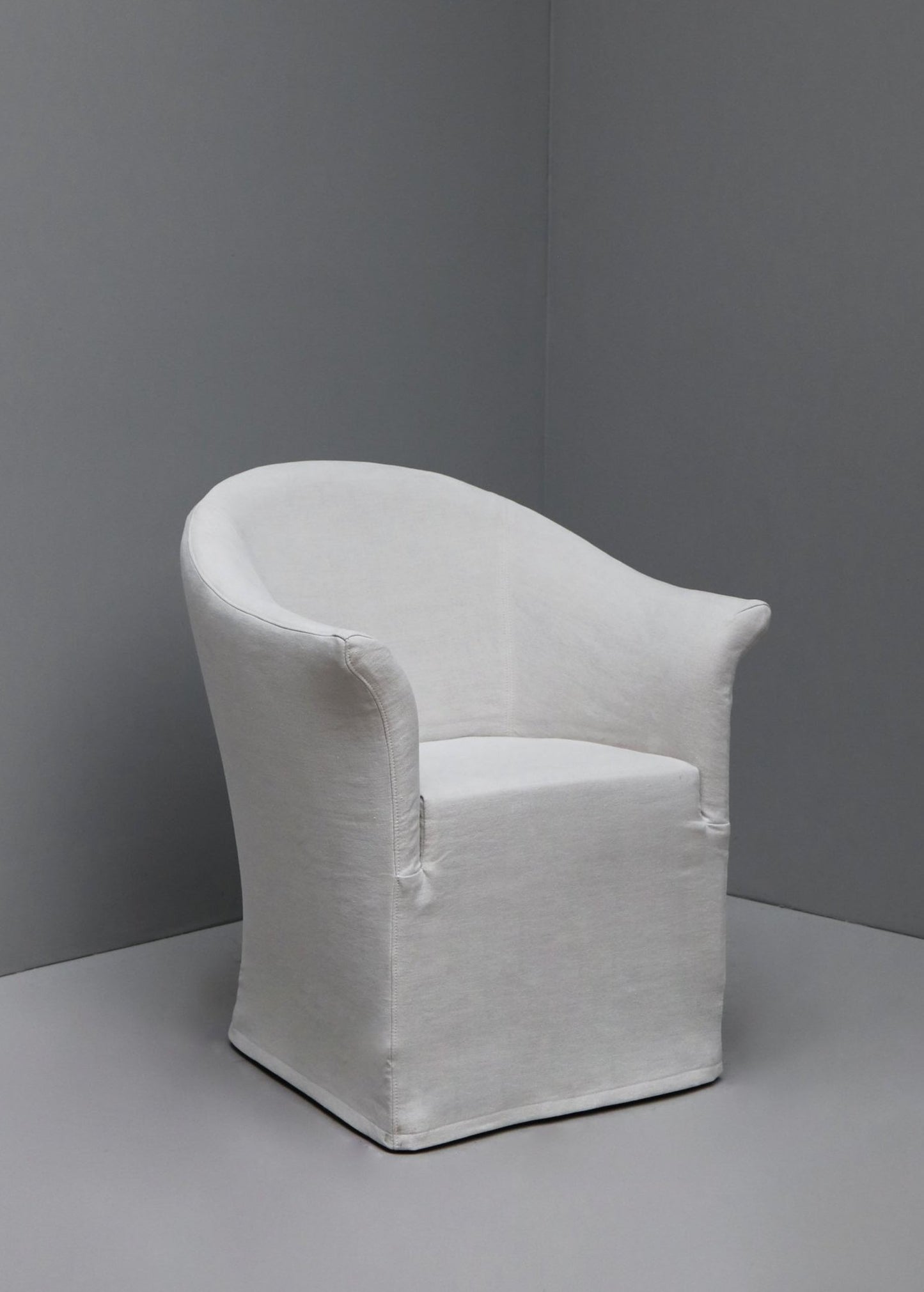 "ROUND DINING ARMCHAIR" BY OLIVER GUSTAV