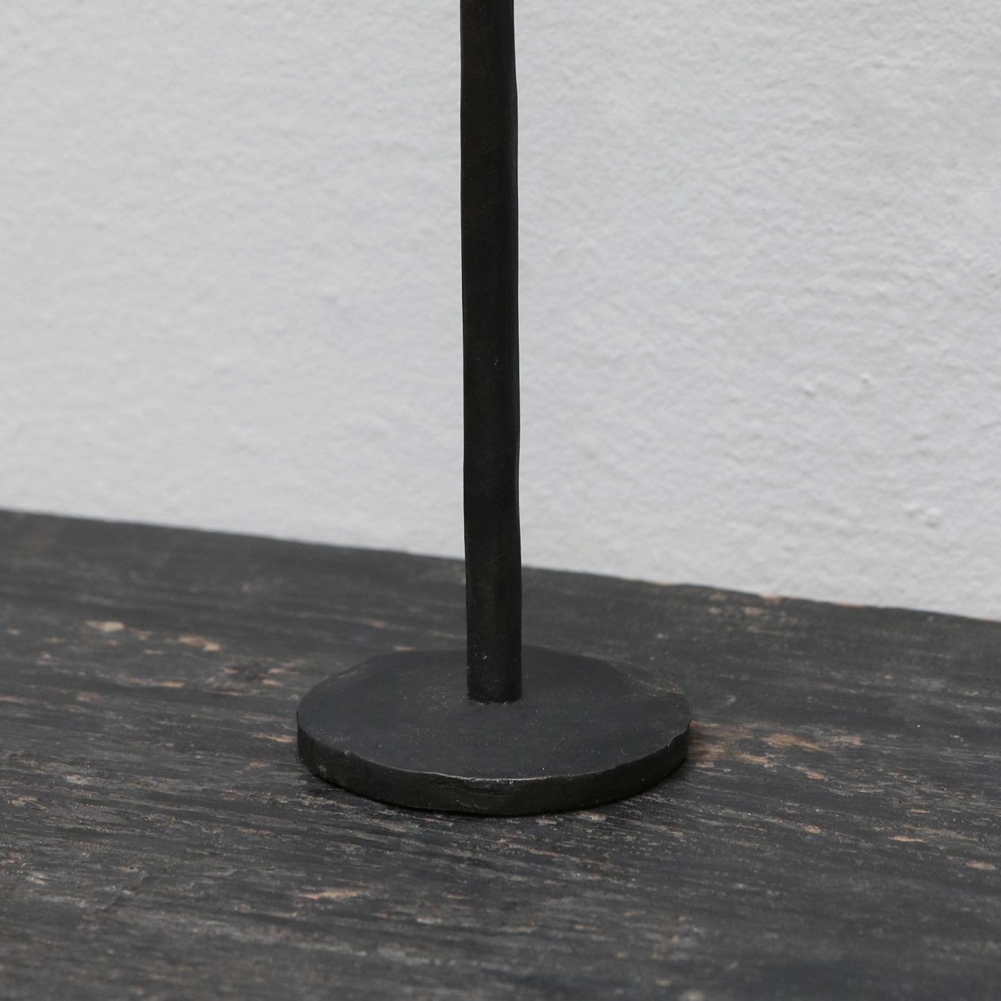 Blackened iron candle stick in small, medium and large