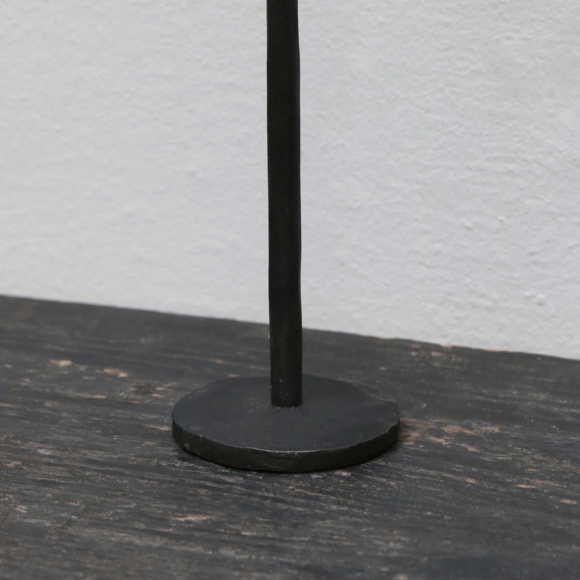 Blackened iron candle stick in small, medium and large