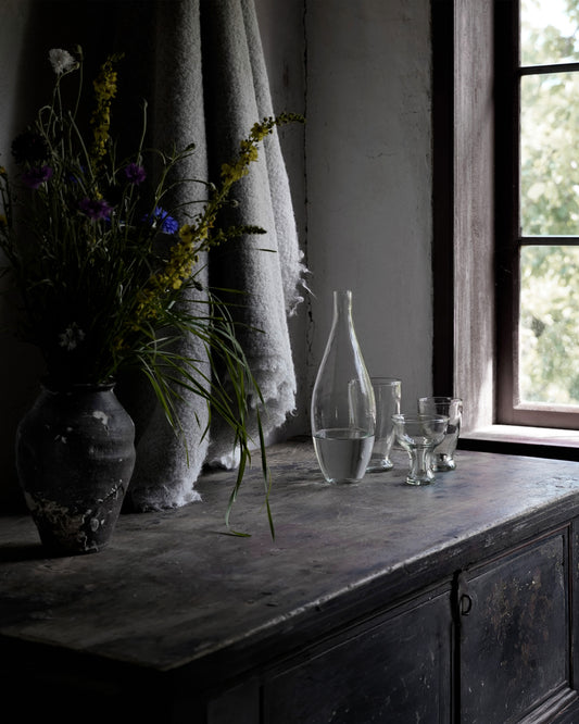 "Clear Glassware Bottle" by Oliver Gustav