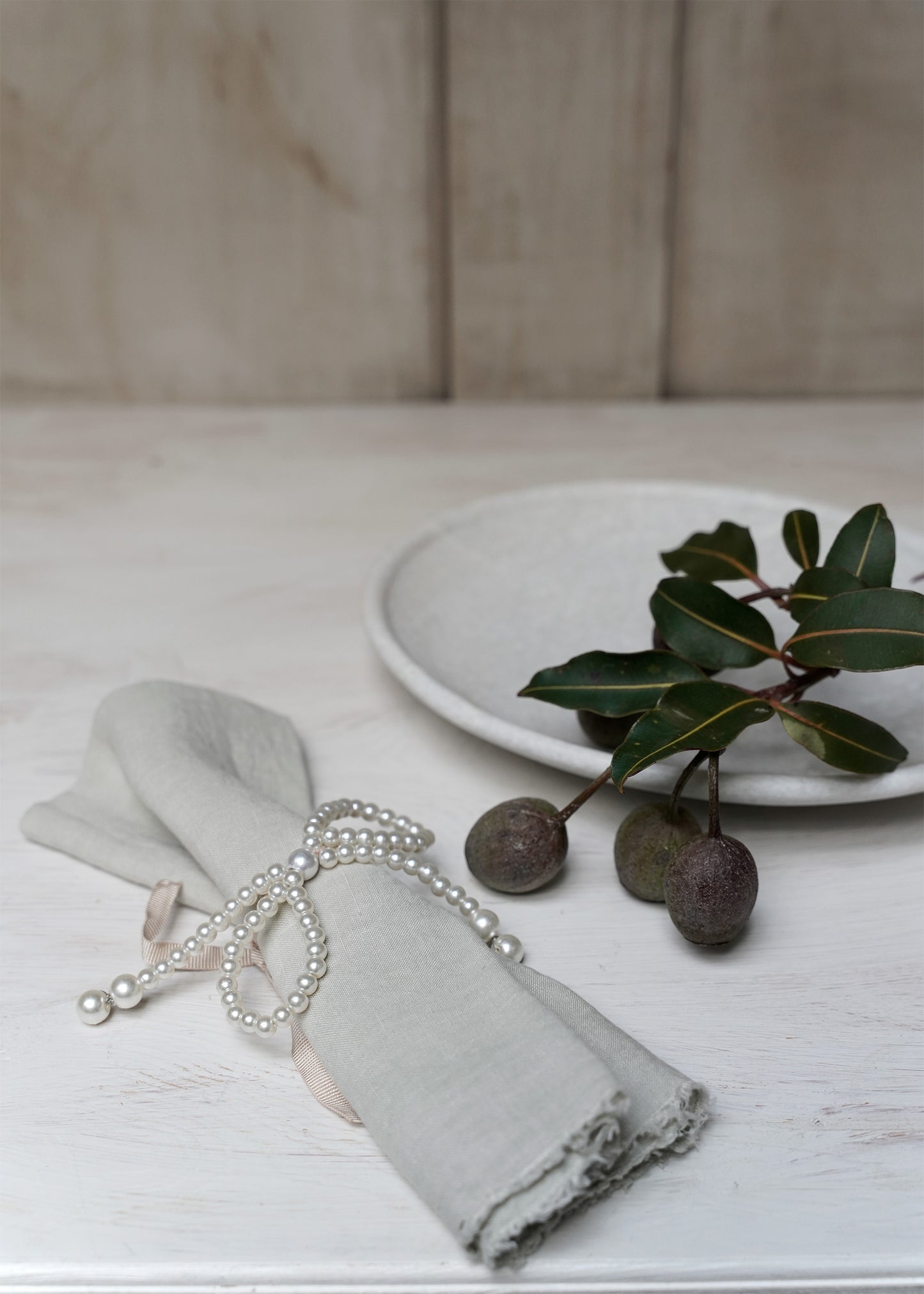 Pearl-bow with pink ribbon