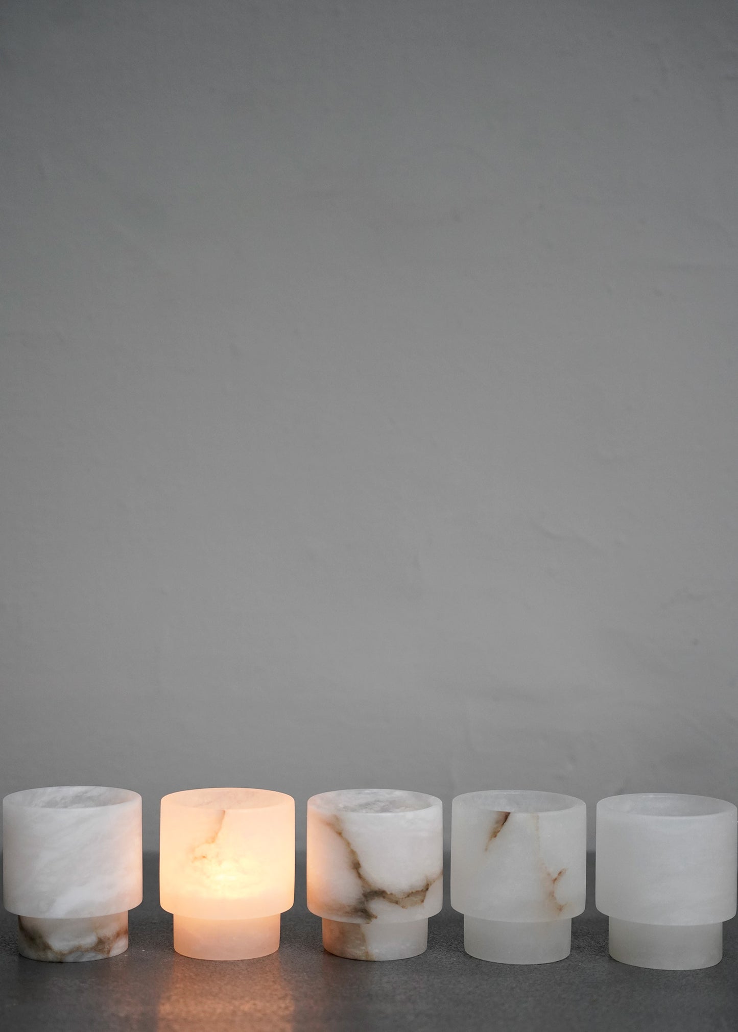 "Tea light Small in white alabaster" by Michaël Verheyden