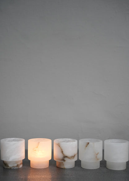 "Tea light Small in white alabaster" by Michaël Verheyden