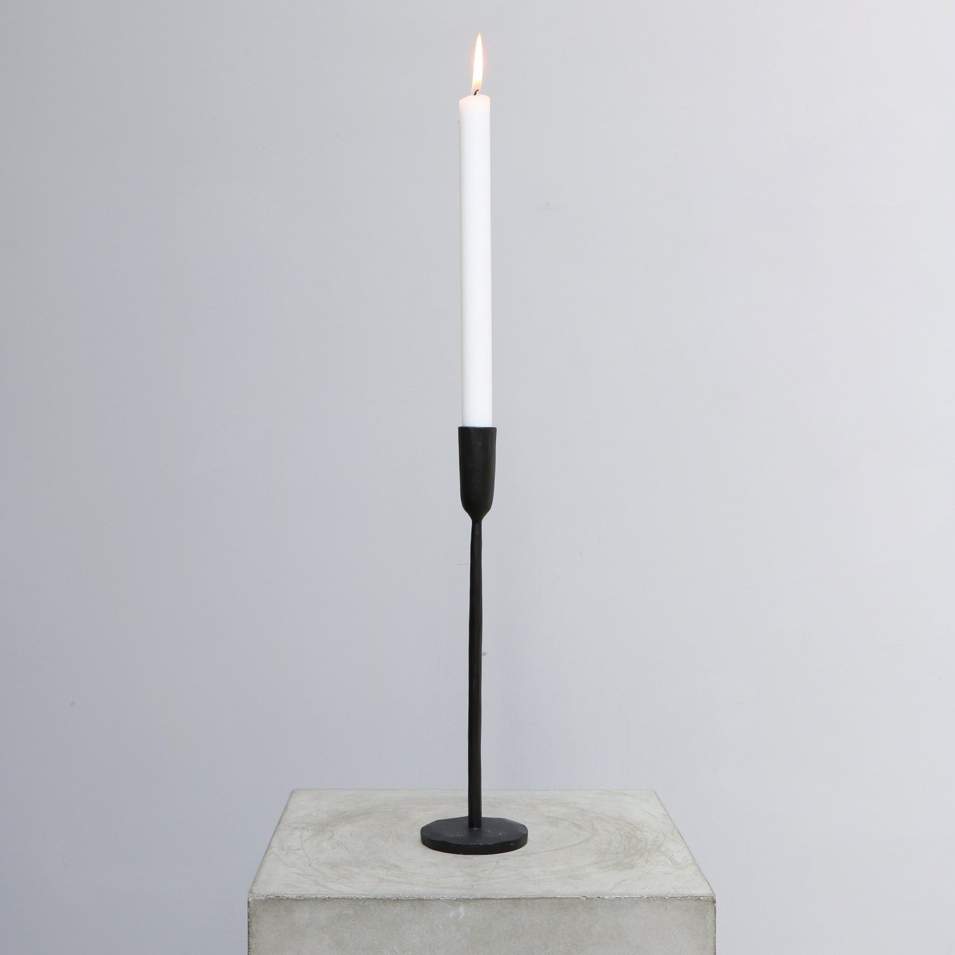 Tall and elegant Iron candle holder available in multiple sizes