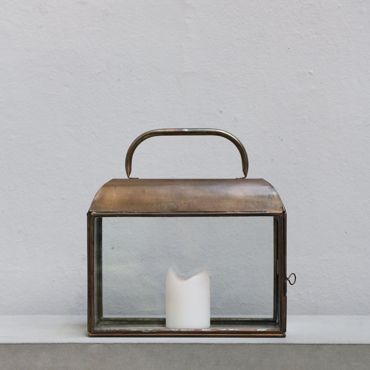 Glas and metal lantern for candle