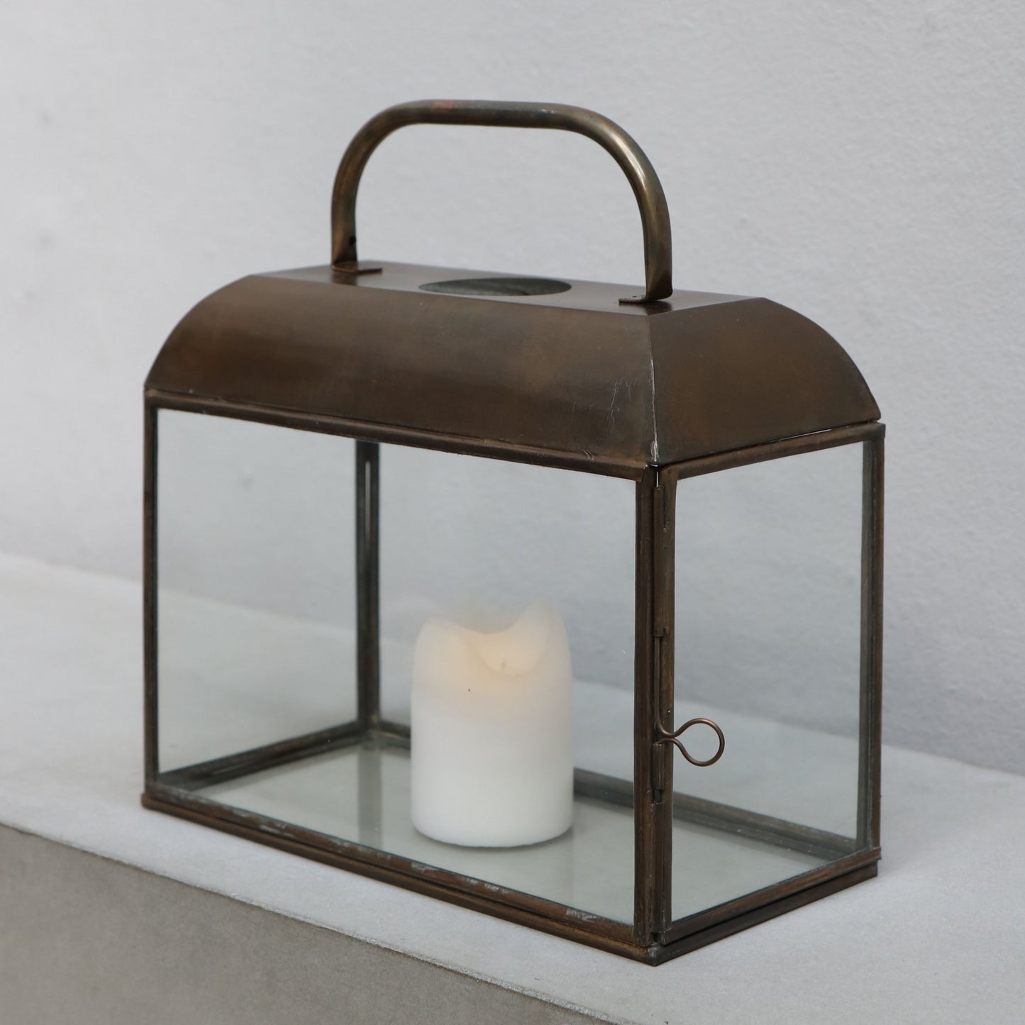 Glas and metal lantern for candle