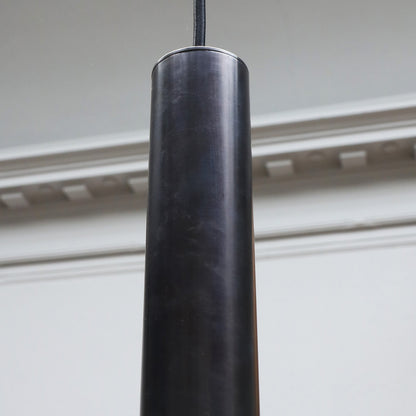 Dark brown patinated brass lamp in minimalistic tube design