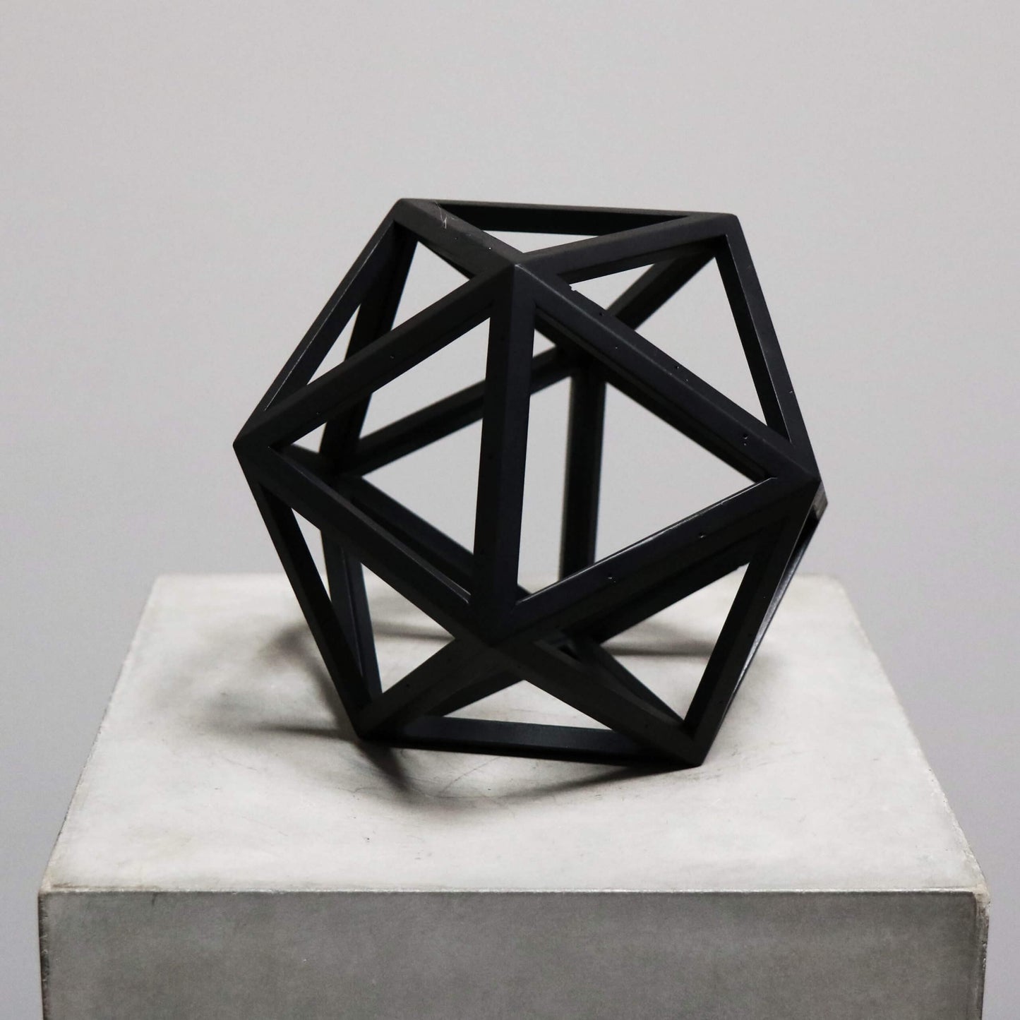 Beautiful geometrical model in burnt black wood for interior design decoration