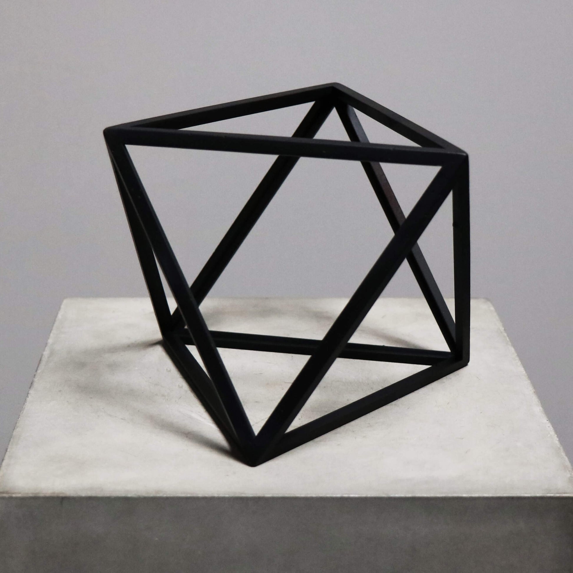 Beautiful geometrical model in burnt black wood